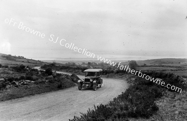 CLIMBING TO LONGWOMAN'S GRAVE FROM BELLURGAN